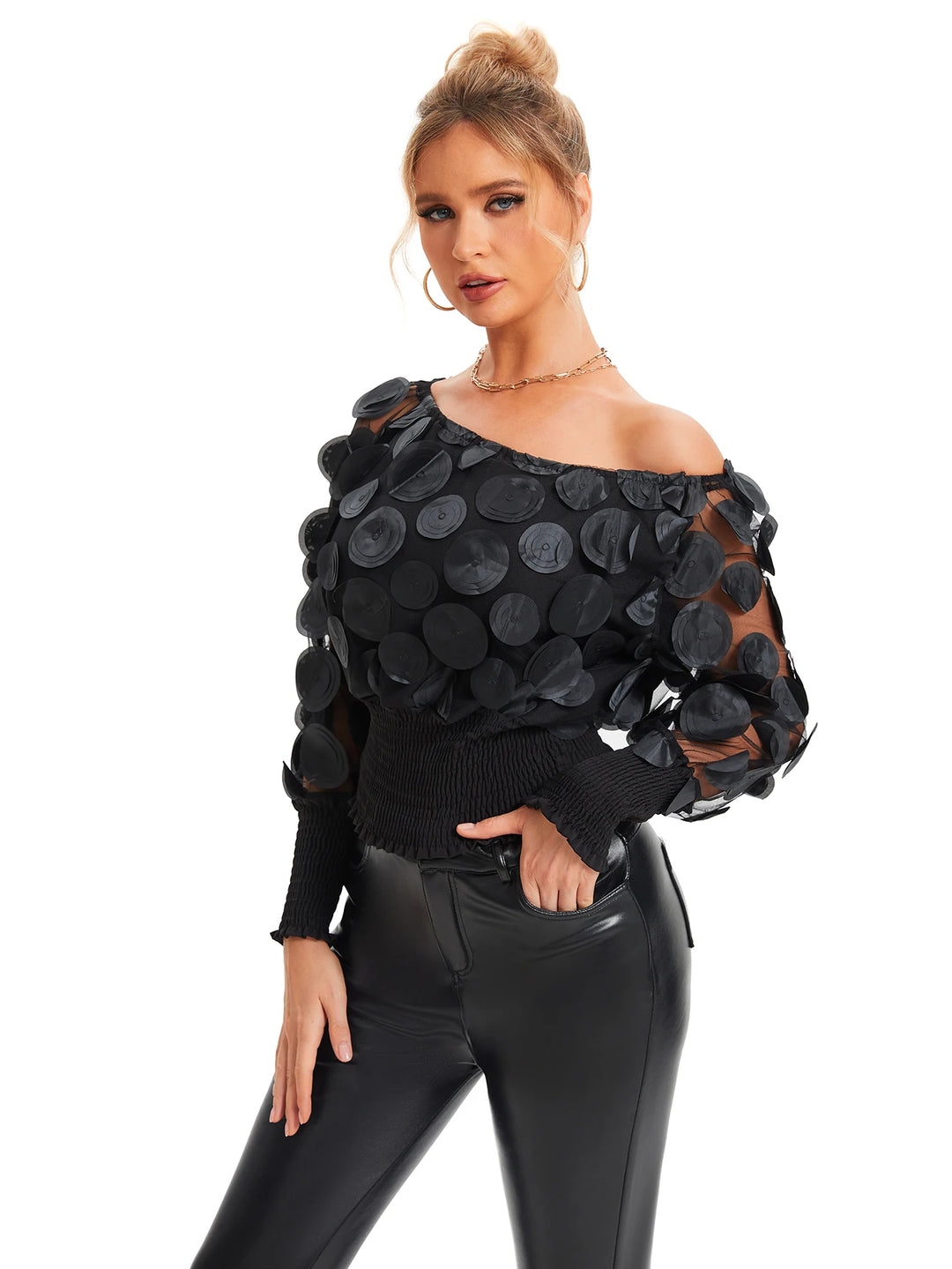 Blouse met schuine schouders en appliqué