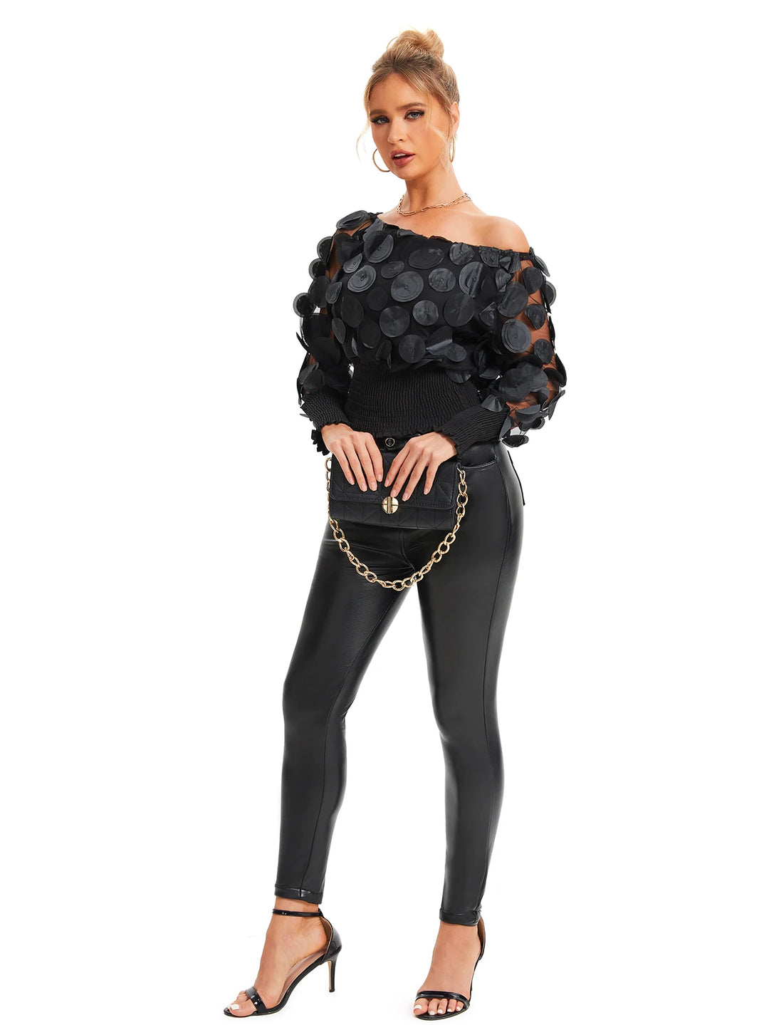Blouse met schuine schouders en appliqué